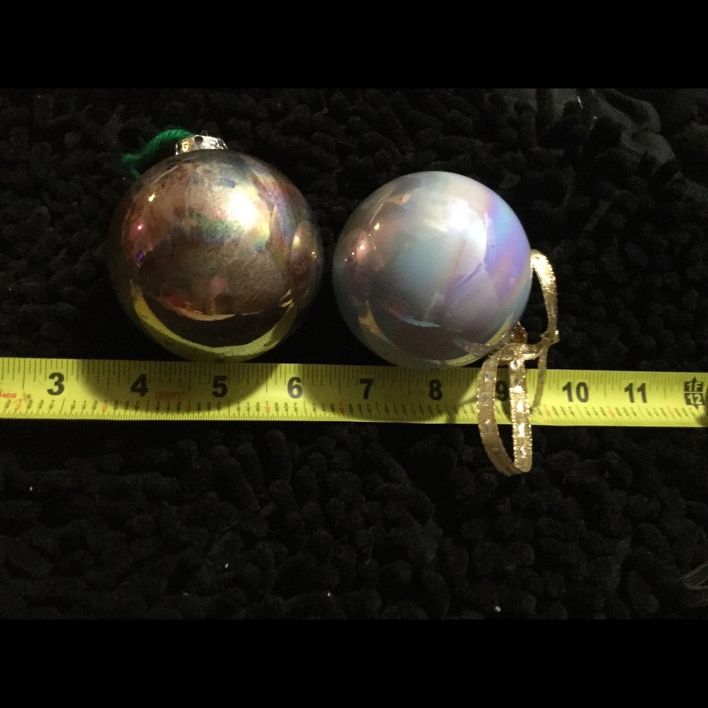 And blowing set up to opalescent Christmas balls